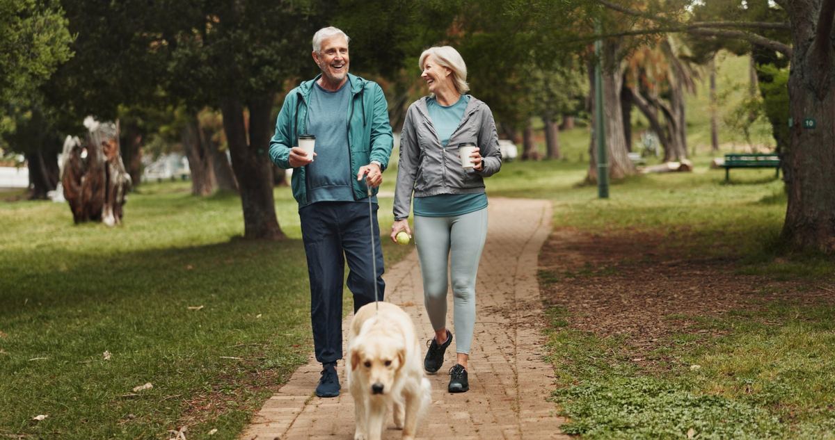 Couple walking outdoors, representing guaranteed lifetime income planning